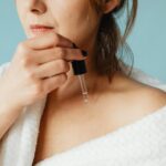 woman applying serum — advanced body care trends 2026