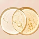 A split image showing the texture of a clear salicylic acid gel on one side and a white benzoyl peroxide cream on the other