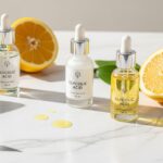 Best glycolic acid serums with citrus fruits on marble surface